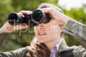 Woman using binoculars