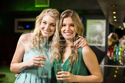 Portrait of friends drinking champagne