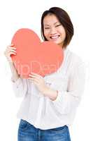 Woman holding heart shape