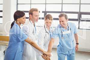 Medical team hands stacked over each other