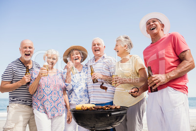 Senior friends having a barbecue