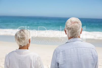 Rear view of a senior couple holding hands