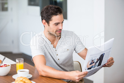 Man reading newspaper