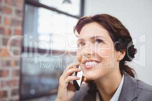 Young businesswoman talking on mobile phone