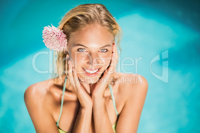 Portrait of beautiful woman near pool