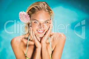 Portrait of beautiful woman near pool