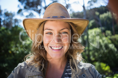 Smiling woman with a hat
