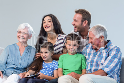 Happy family watching television