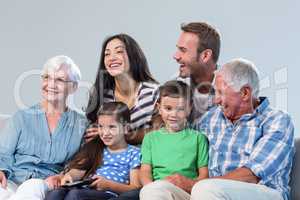 Happy family watching television