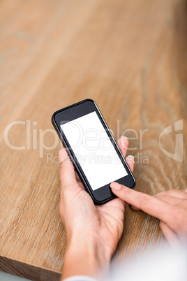 Cropped image of woman using smart phone