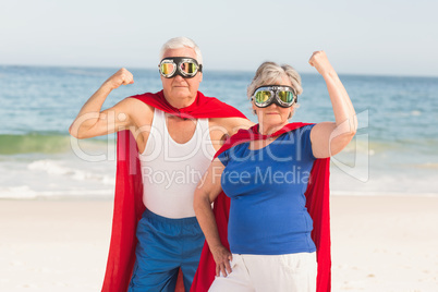 Senior couple wearing superman costume