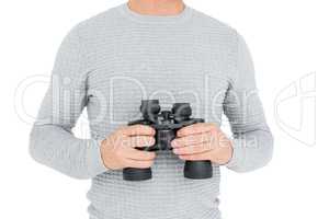 Man holding a binocular