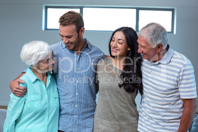 Young couple with their grandparents