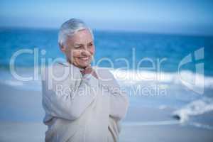 Senior woman relaxing at the beach