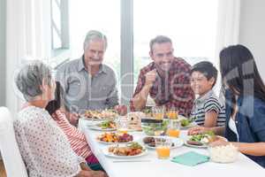 Happy family having breakfast