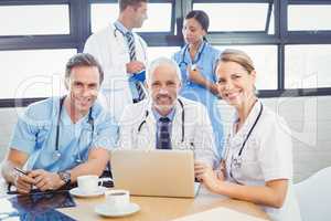 Portrait of medical team smiling in conference room