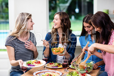 Happy friends having food