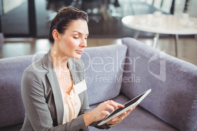 Businesswoman using digital tablet