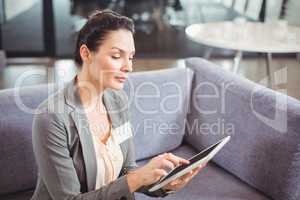 Businesswoman using digital tablet