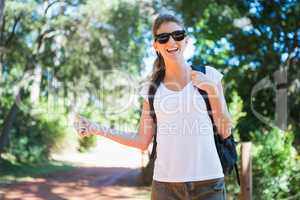 Portrait of woman hitch hiking