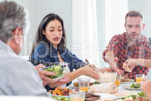 Happy family having breakfast