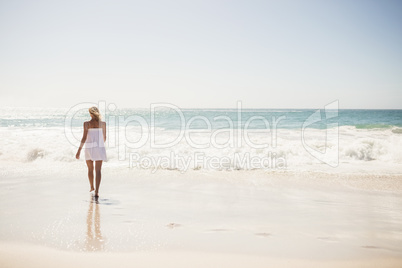 Blonde woman close to water