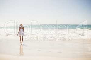 Blonde woman close to water