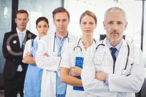 Medical team standing with arms crossed