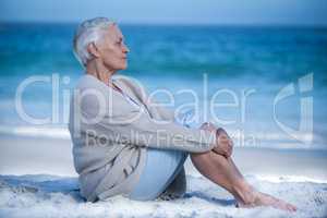 Thoughtful mature woman meditating