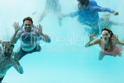 Friends swimming in pool