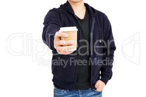 Mid section of man holding disposable coffee cup