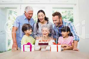 Happy family during birthday party of granny