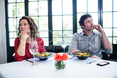 Woman feeling bored and ignoring each other