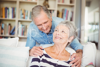 Cheerful senior couple looking at each other