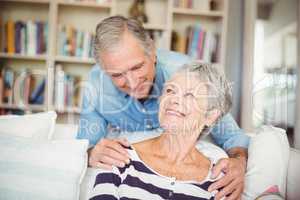 Cheerful senior couple looking at each other