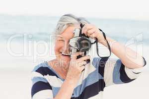 Senior woman taking picture