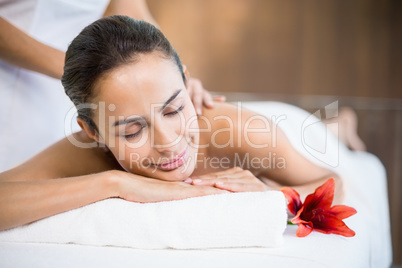 Woman smiling while receiving massage Woman smiling while receiving massage