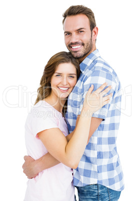 Happy young couple cuddling each other