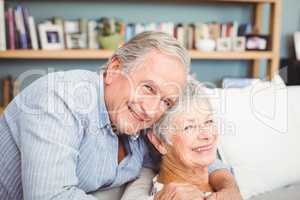 Portrait of romantic senior couple hugging
