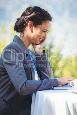 Businesswoman using laptop