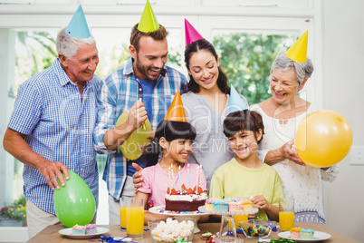 Happy multi generation family during birthday party