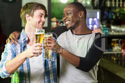 Happy friends having a drink