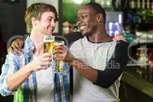 Happy friends having a drink