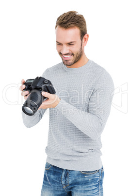 Young man using camera