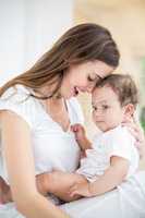 Smiling mother with baby