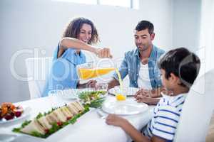 Family having breakfast together