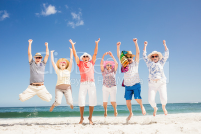 Happy senior friends jumping