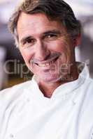 Close-up of smiling chef