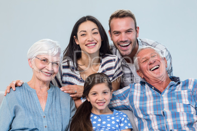 Happy family watching television