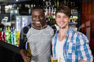 Happy friends having a drink